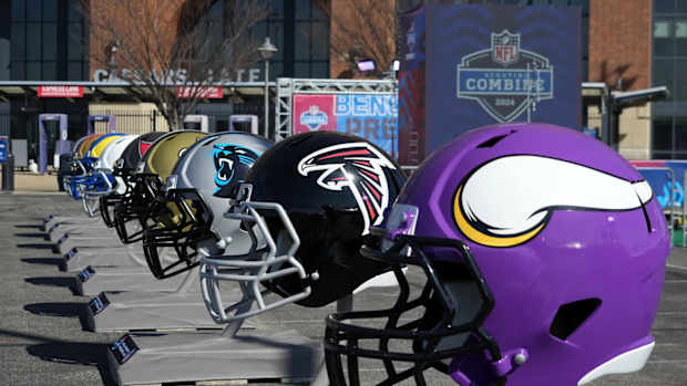 Team helmets lined up outside of the NFL Scouting Combine at Lucas Oil Field in Indianapolis, Indiana.
